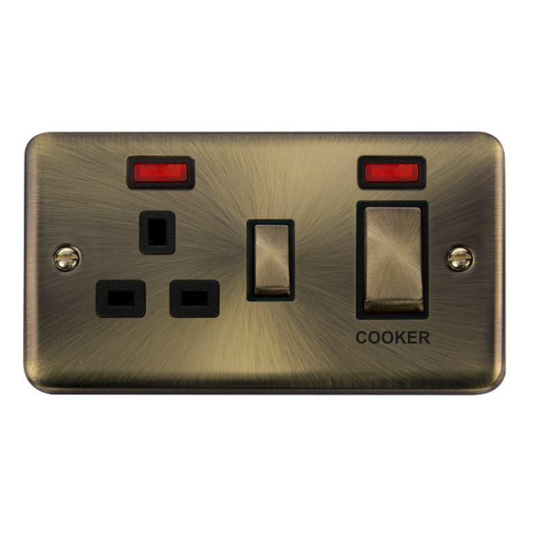 Click Deco Plus 45A 2 Gang DP Cooker Switch with 13A DP Switched Socket with Neon with Neon Antique Brass with Black Inserts
